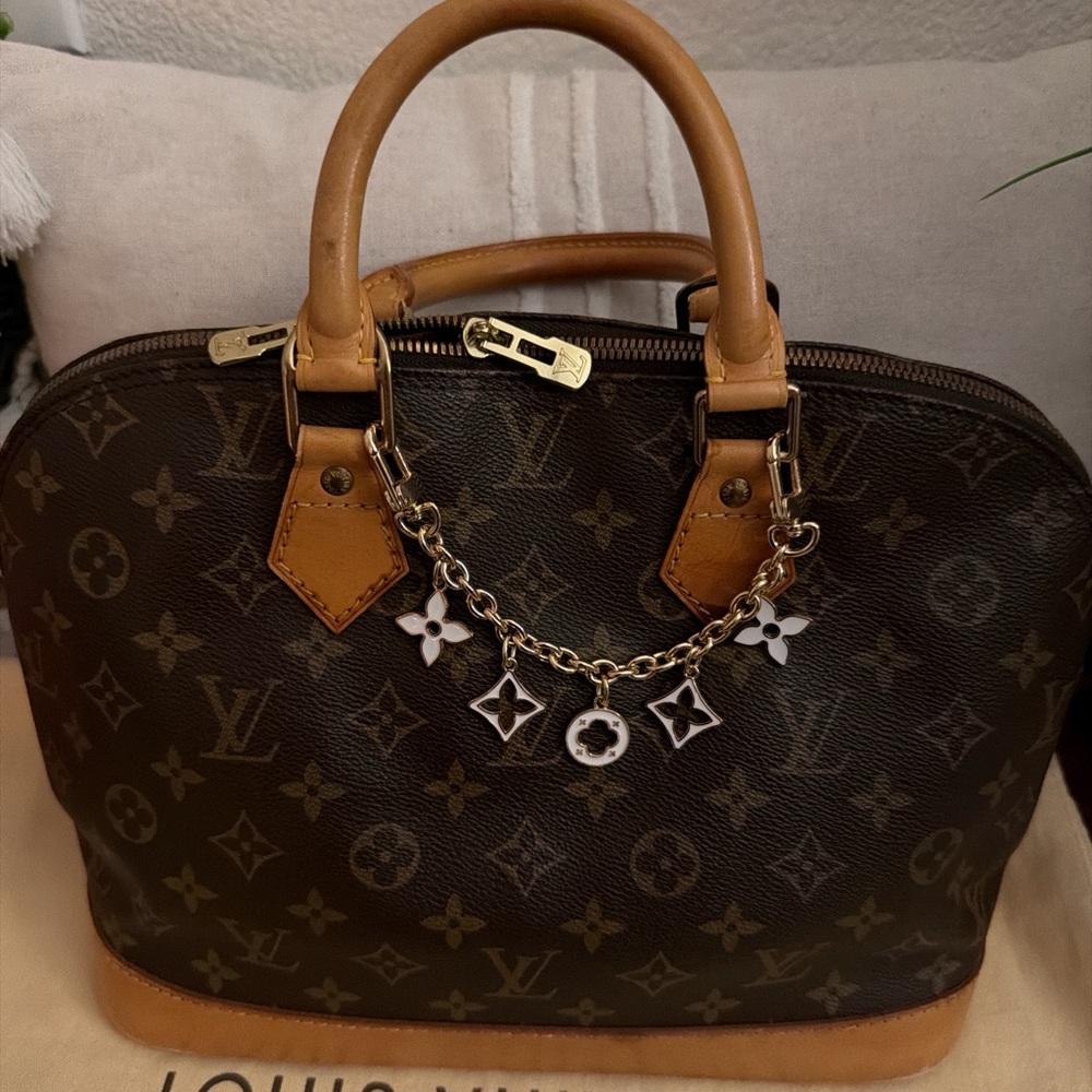 Louis Vuitton Alma Brown Monogram Handbag